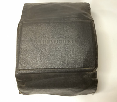 Large, heavy key driven mechanical calculator with a detachable leatherette dust cover.