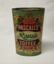 A large oval lidded tin that has been highly decorated with a gold filigree border, and a large scrolled product name. Main colours are red, pink, green and gold. The price for toffees is shown as 4oz for 3 1/2 d.