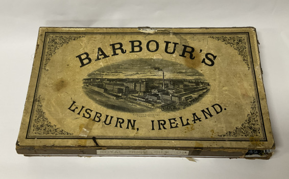 Cardboard box containing a variety of Barbours linen and silk thread 