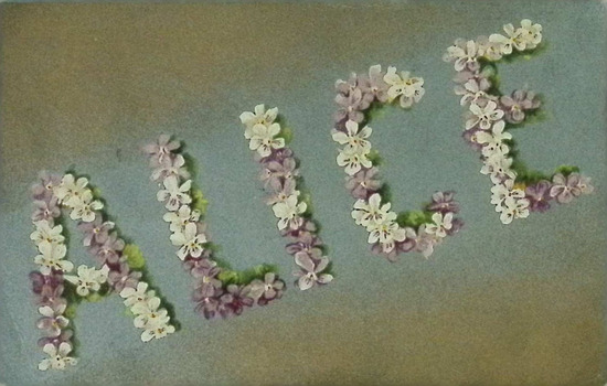 This postcard depicts the recipients name "ALICE",in flowers of white and purple on a silver/yellow background.