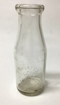 Clear glass milk bottle, one imperial pint (570mL.) capacity, with embossed information. 