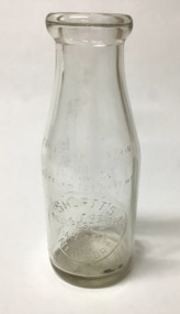 Clear glass milk bottle, one imperial pint (570mL.) capacity, with embossed information. 