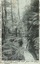 Postcard. Black and white photograph of a mountain pathway with person with a pack and hat on walking.