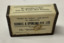Metal matchbox or Vesta cover with black type on white background, covered in clear plastic. From Scovell and Spurling menswear stores in Footscray and Williamstown.
