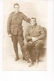 Photograph copied in Sepia of Joseph (Joe) Maffersoni seated, in WWI Other person unknown
