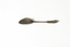 A silver spoon featuring floral motif on the head