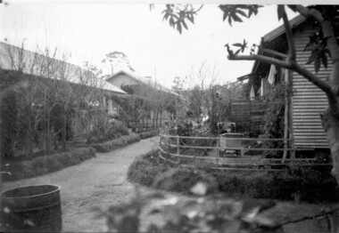 Photograph, Compound B Row of family huts, 1945