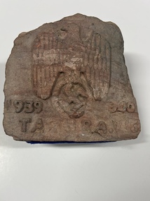 Plaque, carved rock, approx 1940