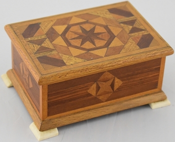 Wooden Handmade box with inlay top and sides, bone feet attached at bottom corners