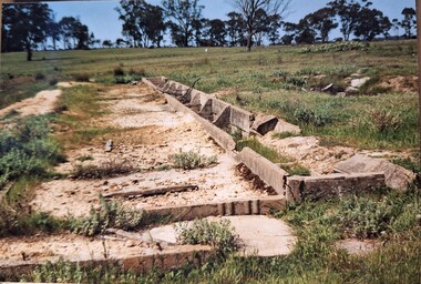 Photograph, Arthur Knee, Camp 13 latrine block remains, 1989