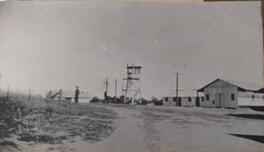 Photograph, Camp Buildings and sentry tower, 1939