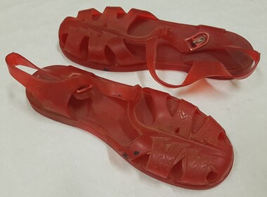 Red plastic sandals