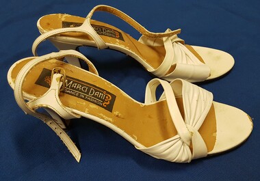Ladies white high-heeled sandals