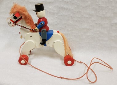 Leisure object - Wooden pull-a-long horse with soldier