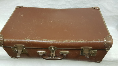 Suitcase with NSC uniforms inside