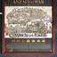 Timber  frame housing a poster/photograph taken of  the 11th Battalion  soldiers standing and sitting on the Cheops pyramid in Egypt. 