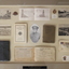 Framed Collection of personal effects Including photographs and badges