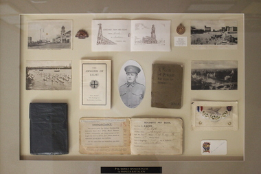 Framed photograph and objects, Pte Sidney Spencer Plum