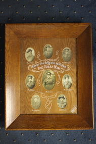 Brown timber frame and mount containing eight photographs of soldiers.