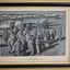 Black frame containing black and white photograph of airmen with aircraft in background
