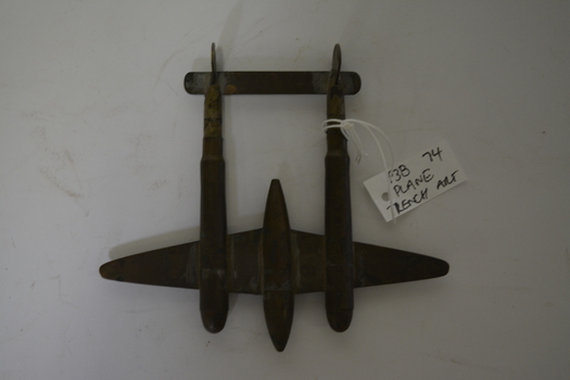 Brass shell castings in form of P38 Lockheed lightning plane