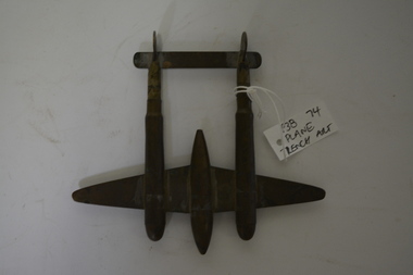 Brass shell castings in form of P38 Lockheed lightning plane
