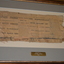 Framed newspaper article from The Argus dated May 15, 1915