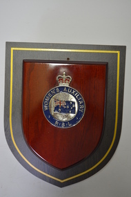 Meta logo with Crown and Australian Flag mounted on timber shield
