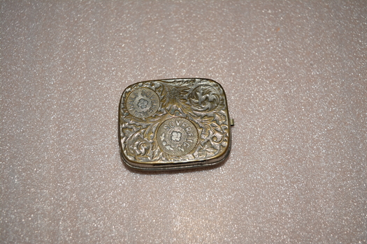 Ornate square silver metal sovereign case