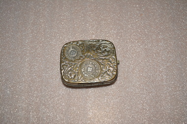 Ornate square silver metal sovereign case