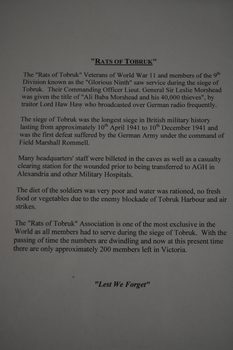 One page typed article housed in black frame