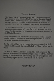 One page typed article housed in black frame