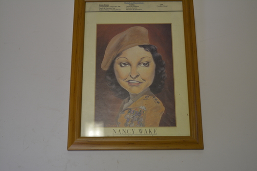 Brown timber frame containing caricature of female in uniform wearing a beret
