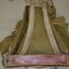 Khaki canvas bag with large pocket and two side pockets - backpack on a metal triangular frame with three leather straps