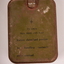 Green metal oblong container with ring pull attached