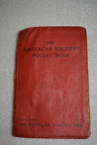 Small red book with plastic canvas cover with black writing on cover