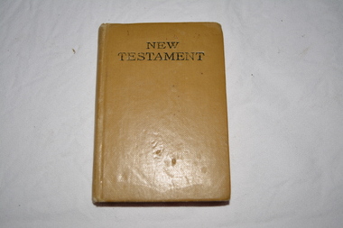 Small mid brown coloured book of the New Testament