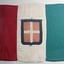 Large Italian flag with green, white and red vertical panels of equal size defaced with the Savoyan coat of arms, a red shield with white cross bordered with blue.  Three two-piece hoist ties on the green side. 