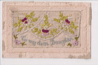 White rectangular postcard with embroidered pink, purple flowers green foliate decoration on front.