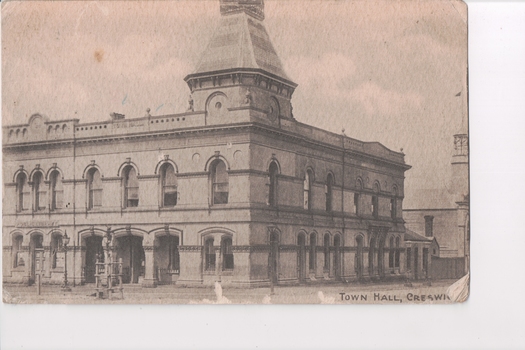 Postcard with a black and white photograph of Creswick Town Hall. Handwritten message on back.