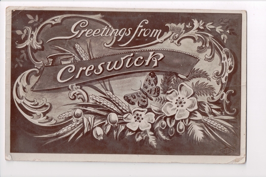 Postcard with a sepia coloured drawing of a banner and ornate cornucopian bouquet of flowers and wheat grains.  