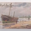 Colour postcard with a drawing of a boat with two masts, next to a beach at low tide. 