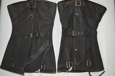 Each gaiter has a pair of buckles and straps on the side and a buckle and leather strap at the bottom that is fitted under the sole of the boot. 