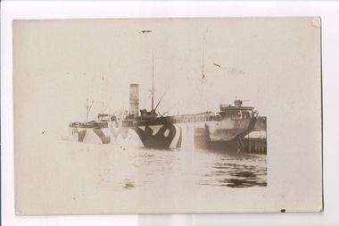 Faded photograph of war ship