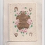 Postcard with attached booklet embossed with flowers, hearts and horseshoes