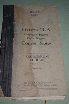 Manuel has black binding with black cord.  Hard cover  is a dirty cream colour with black writing.  Water stain on front cover.