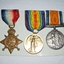 round silver coloured metal medal with grey black white and orange striped ribbon -
round gold coloured metal medal with purple blue green yellow and orange striped ribbon and
bronze coloured star shaped metal medal with blue white and red striped ribbon