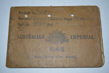 Brown canvas booklet with rising sun emblem and writing in black ink.