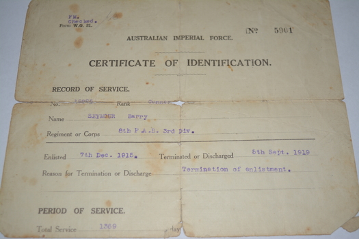 Light blue paper document with black writing