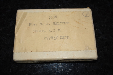 Box containing Medal, Pte G J Malcolm 3536